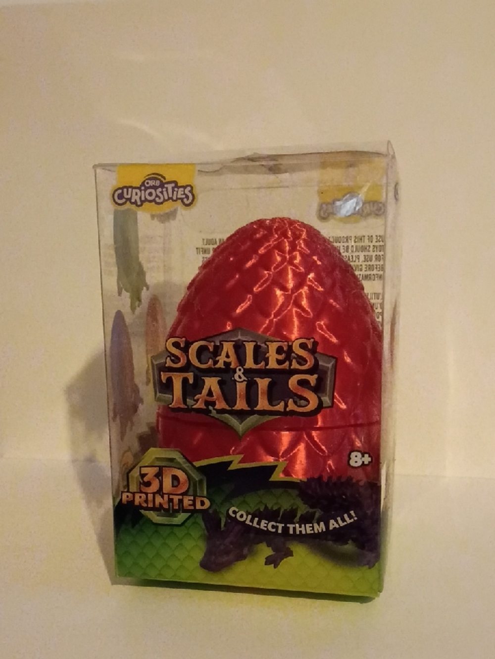 NIB Scales & Tails Red Collectible Egg Toy